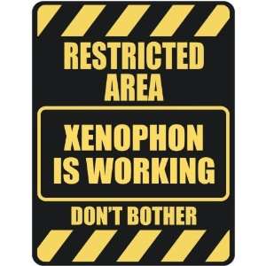   RESTRICTED AREA XENOPHON IS WORKING  PARKING SIGN