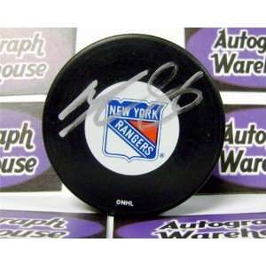 Wojtek Wolski Autographed Hockey Puck   2011 )   Autographed NHL Pucks 