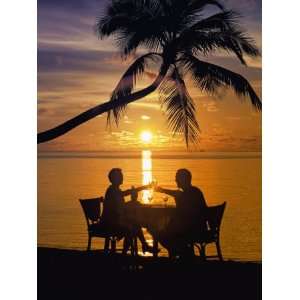 Couple Having Dinner at the Beach, Toasting Glasses, Maldives, Indian 