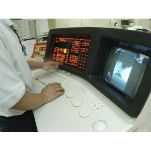  Doctor at Control Panel of Cat Scan Machine Photographic 