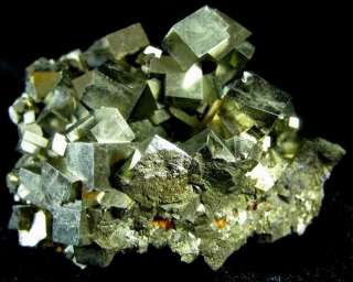 pyrite specimen numerous cubic crystals aggregating together 