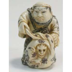  Netsuke Shoki with Oni in sack