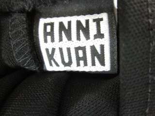 You are bidding on an ANNI KUAN Black Long Straight Skirt in a Size 