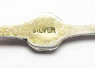   silver spoon with a winners up on top for you this spoon is in good