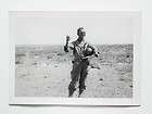 Vintage Snapshot Photo Soldier w/ Sunglasses in Field Holding Helmet 