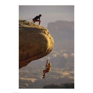  View of rock climbers on the edge of a cliff Poster (18.00 