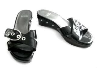 with silver buckle and studs wooden clog style slide sandals by Stuart 