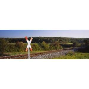 Railroad Crossing Sign near a Railway Track, Germany Premium 
