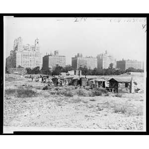  Squatters shacks in Central Park,skyscrapers,1932