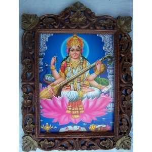 Godess Saraswati in lotus Flower with peacock & Saraswati veena poster 