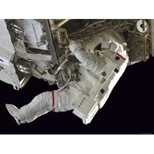 Astronaut Participates in Extravehicular Activity Premium Poster Print 