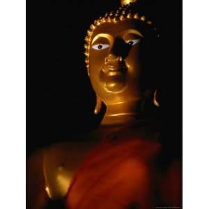  Illuminated Statue of Orange Robed Buddha, Thailand 