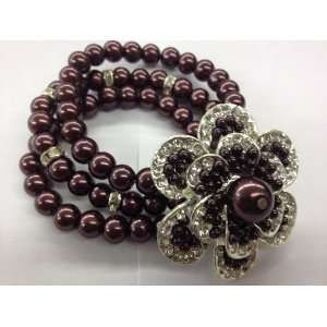   brown pearl rhinestone bracelet with flower design 
