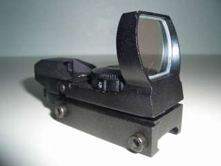  at a DUAL TACTICAL 4 RETICLE GREEN / RED DOT SCOPE REFLEX SIGHT 