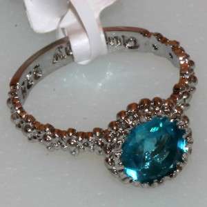   silver 7 mm round faceted blue topaz color quartz ring, Size 7.75