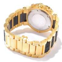  attaches around your wrist with gold tone outer links and black 