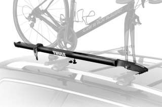The Thule Peloton Fork Mount Rooftop Bicycle Carrier mounted on a car 